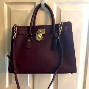 Burgundy satchel bag with shoulder strap—gold chain